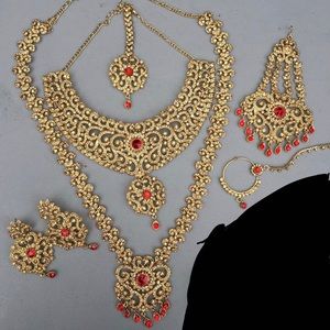 Gold and red Pakistani bridal jewelry 7-piece set